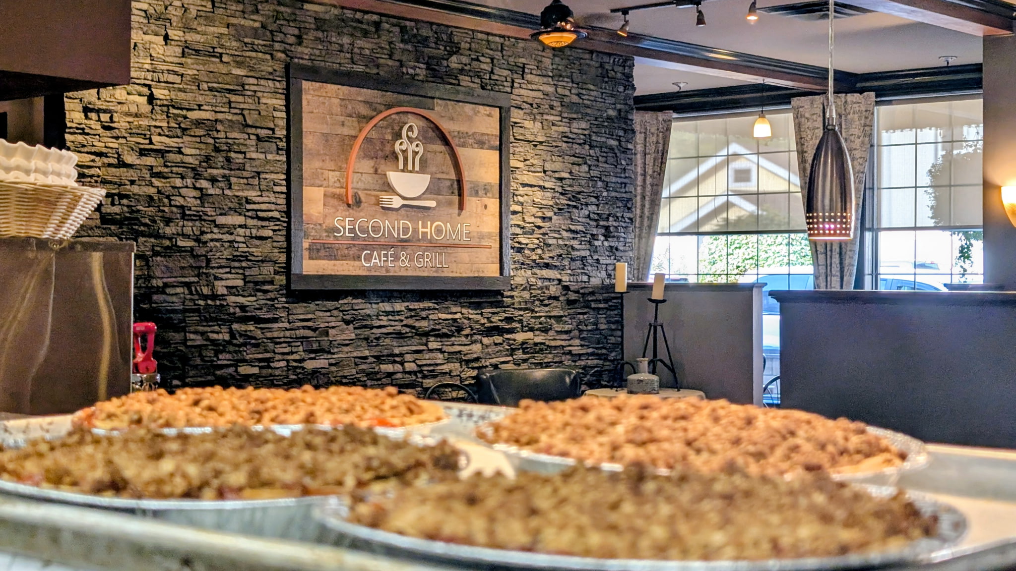 Freshly baked peach strawberry crumble pie at Second Home Cafe & Grill